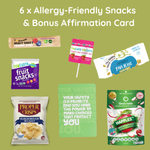 Collection of allergy-friendly snacks and a bonus affirmation card on a green background