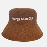 Brown bucket hat with 'Allergy Mum Club' text on a white background