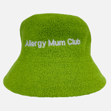 Green bucket hat with 'Allergy Mum Club' text on a white background