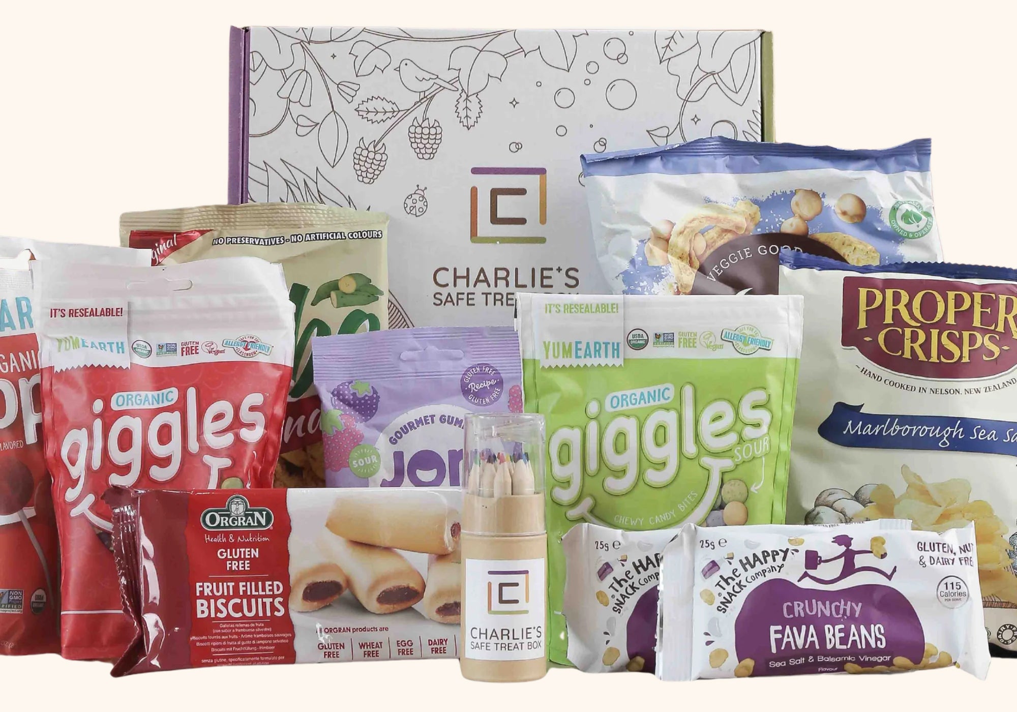 Assorted snack packages including 'giggles' and 'Proper Crisps' on a white background.