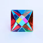 Colorful geometric crystal on a light blue background