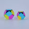Two colorful geometric shapes on a light gray background