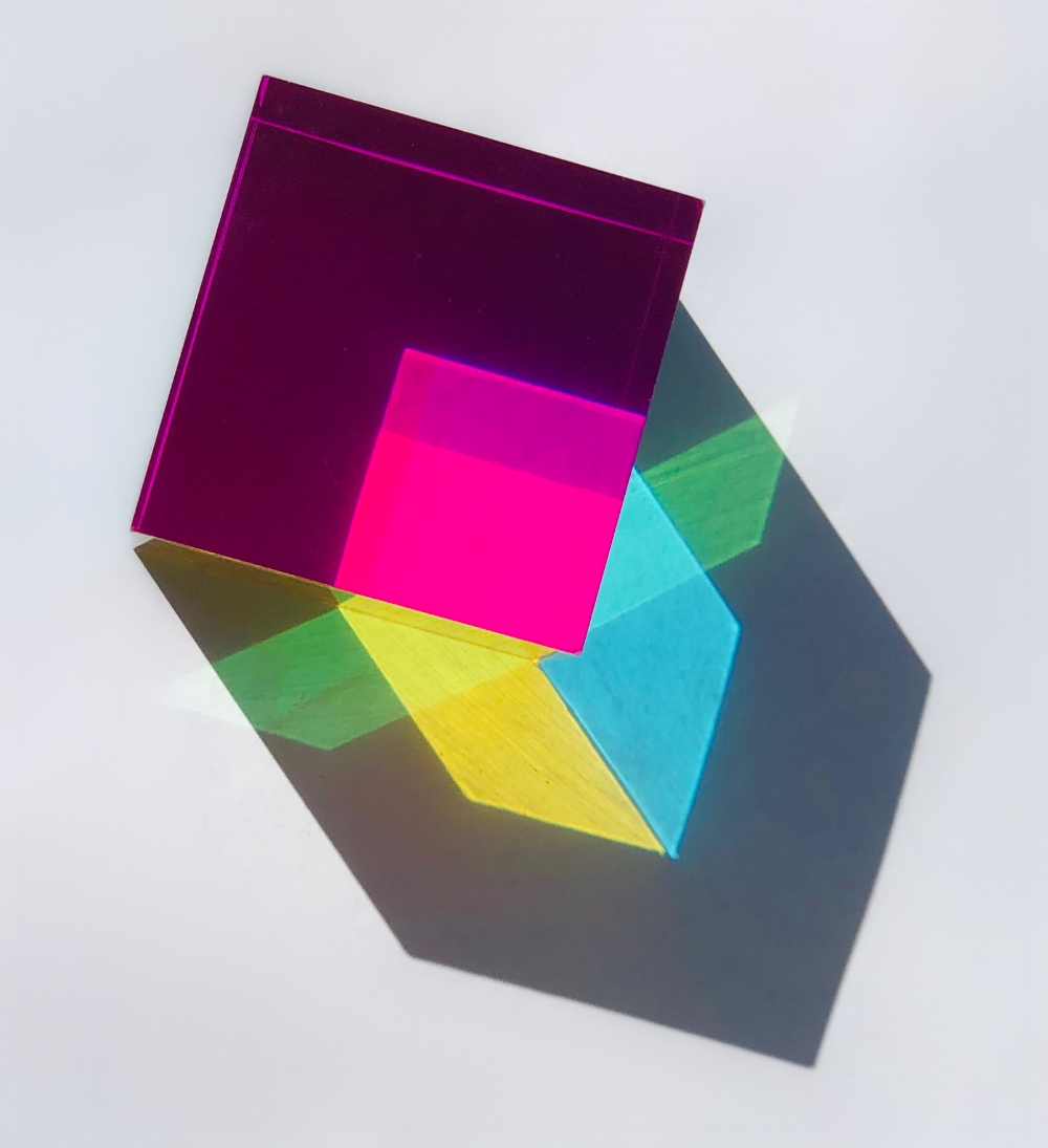 Colorful transparent sheets with a gradient effect on a white background
