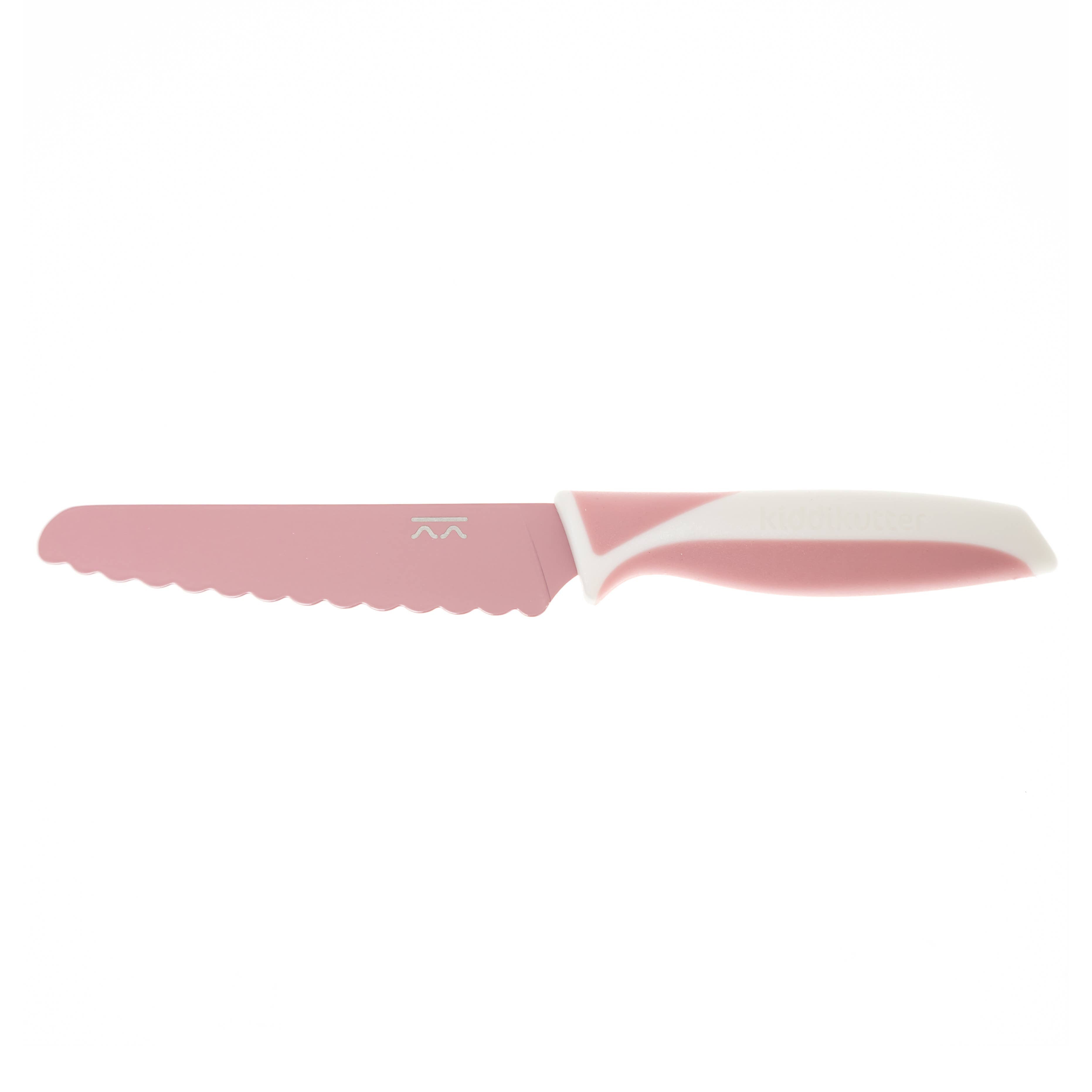 Pink knife with white handle on a white background