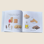 Open book showing illustrations of food allergy peanut items on a light beige background