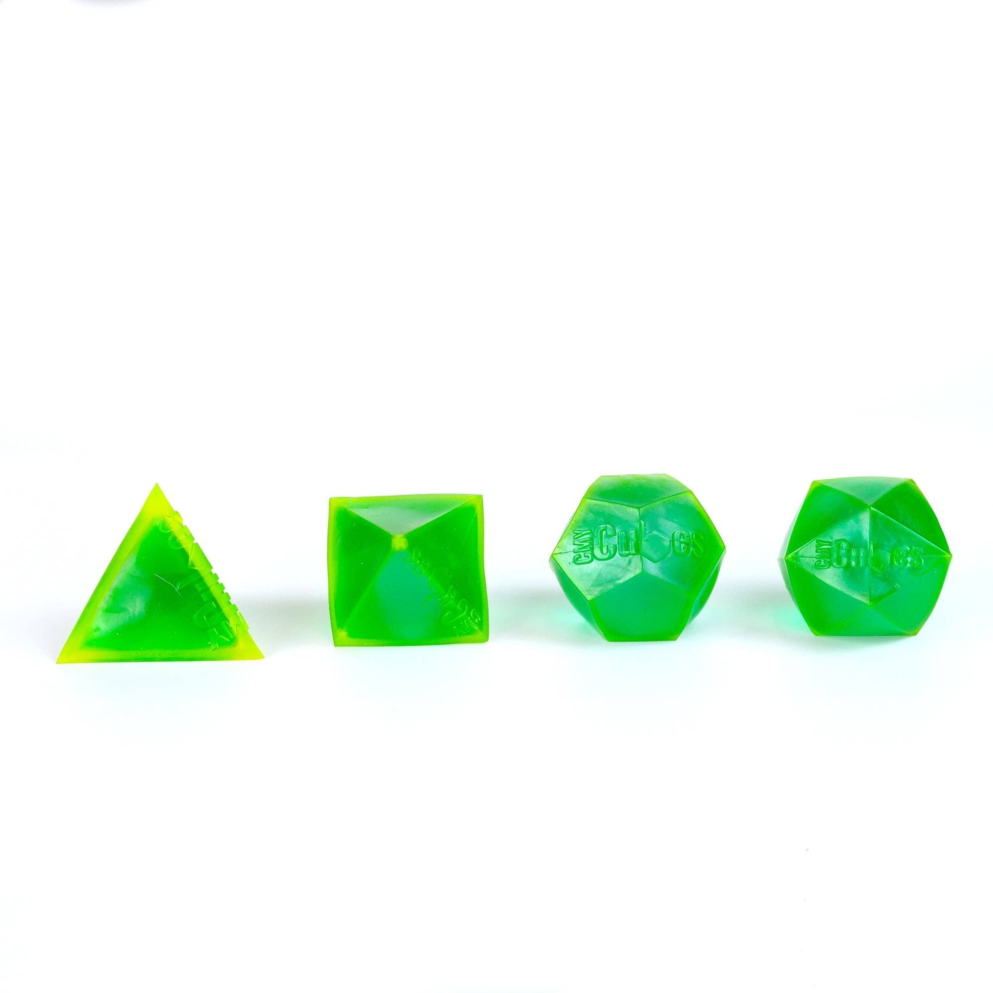 Set of green polyhedral dice on a white background