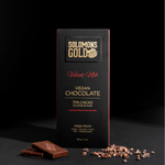Solomons Gold Vegan Chocolate bar Velvet Nibs packaging on a dark background