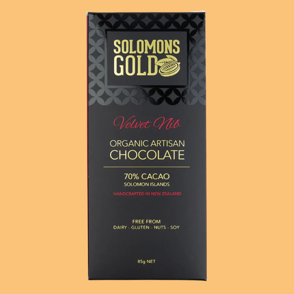 Solomons Gold Velvet Nib 70percent cacao organic artisan chocolate bar packaging on a beige background