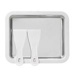 Stainless steel tray with two white spatulas on a white background