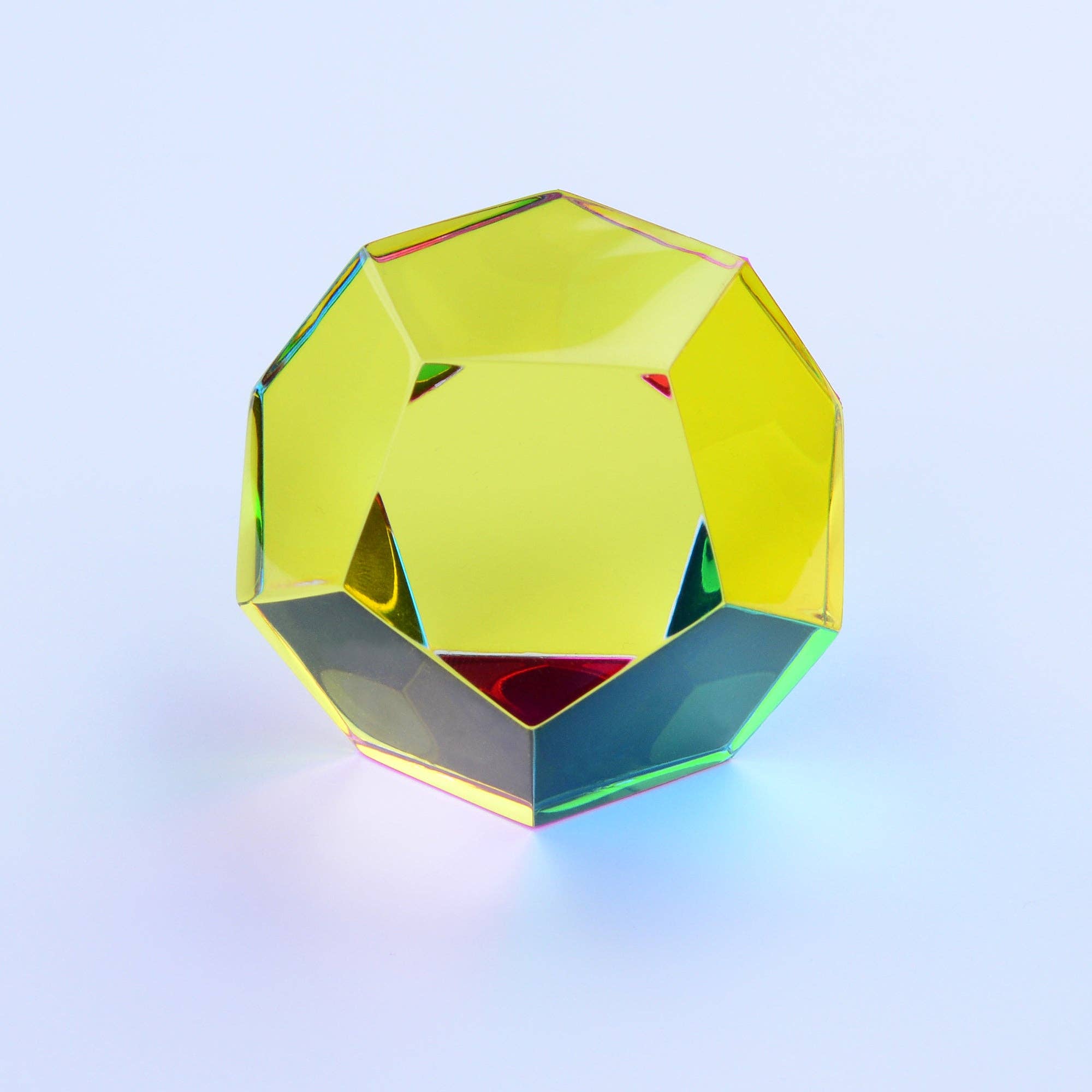 Multicolored geometric object on a light blue background