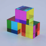 Stack of transparent, multicolored cubes on a light gray background