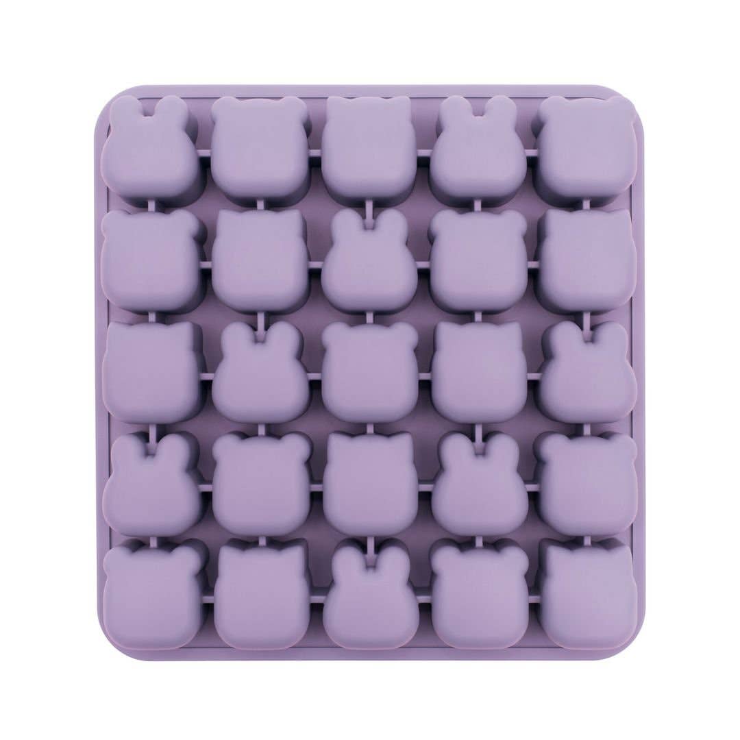 Silicone mold with bear shapes in purple on a white background
