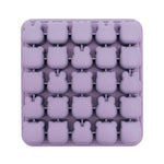 Silicone mold with bear shapes in purple on a white background