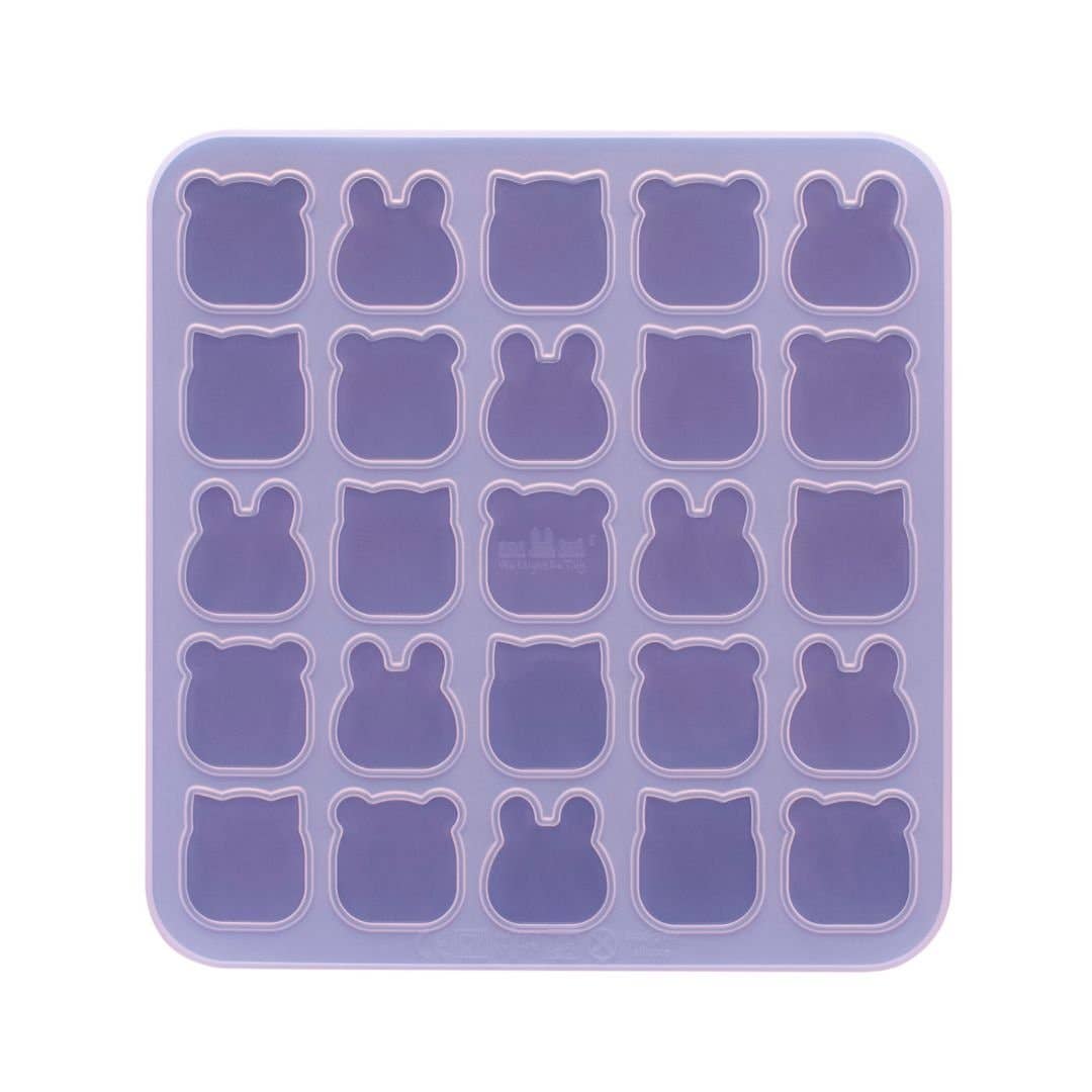 Silicone mold with bear shapes on a white background