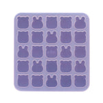 Silicone mold with bear shapes on a white background