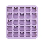 Purple silicone mold with bear-shaped cavities on a white background