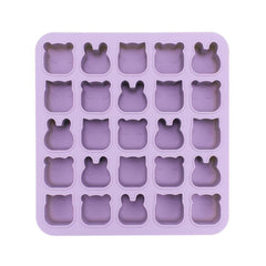 Purple silicone mold with bear-shaped cavities on a white background