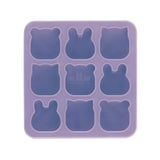 Silicone mold with bear shapes on a white background