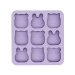 Purple silicone mold with bear shapes on a white background