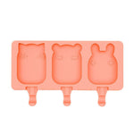 Coral silicone mold with bear, fox, and rabbit shapes on a white background