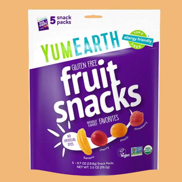 YumEarth gluten-free fruit snack package on a beige background