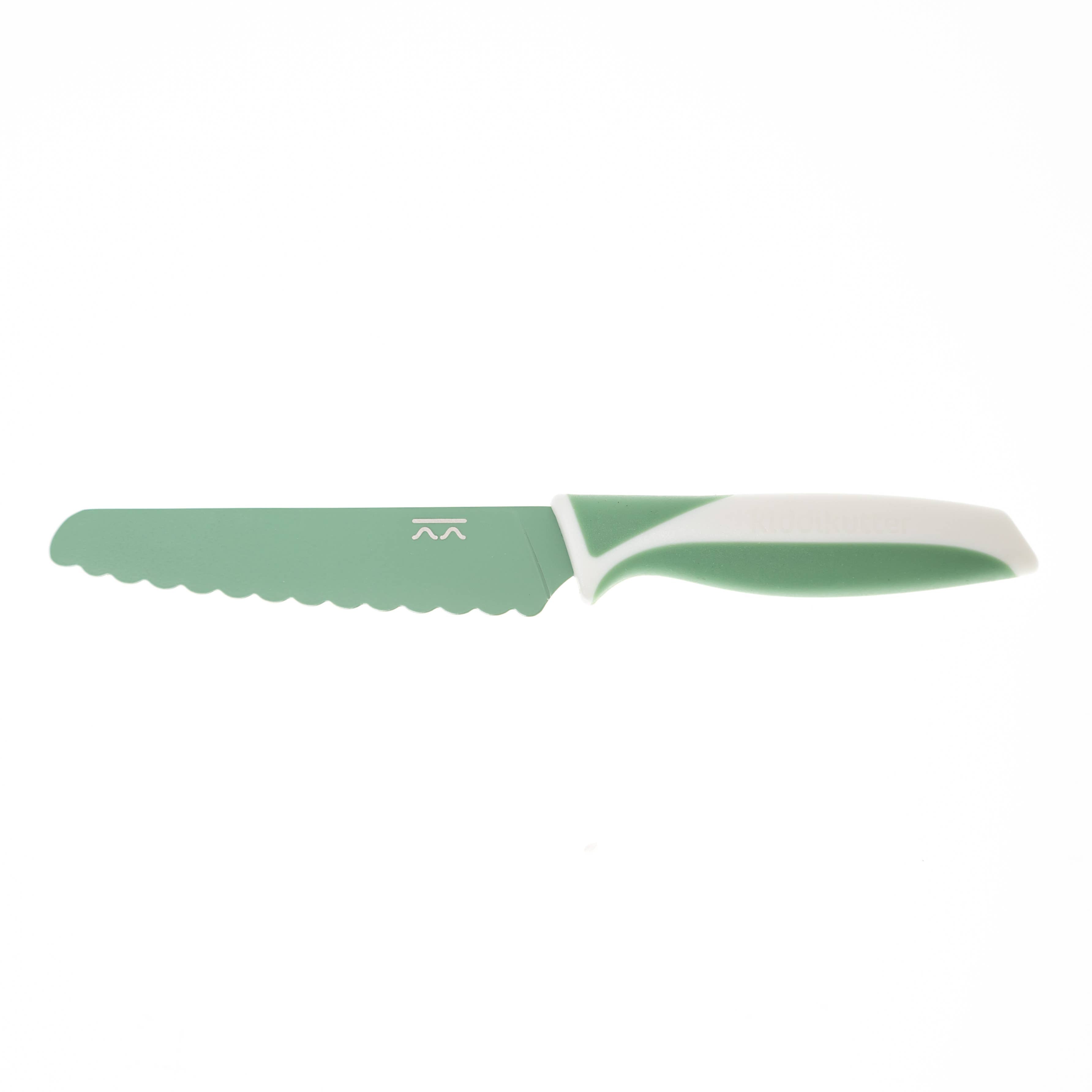 Green knife with white handle on a white background